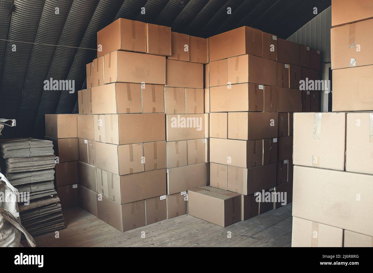 Cardboard boxes stacked in warehouse. Boxes with goods prepared for