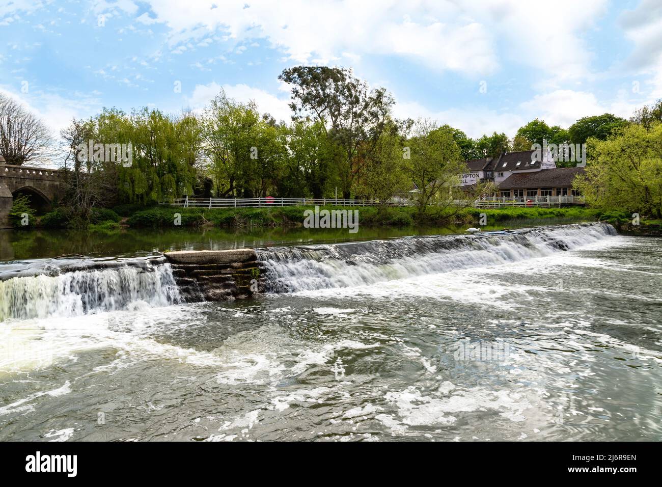 Bathampton Mill restaurant overlooking Lower Avon River and Bathwick Weir, Bath, Somerset, England, United Kingdom. Stock Photo