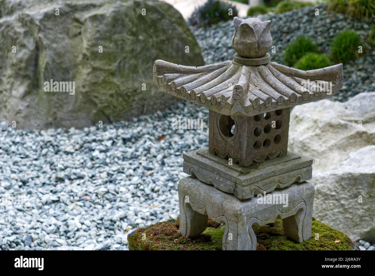 stone temple in a zen garden Stock Photo