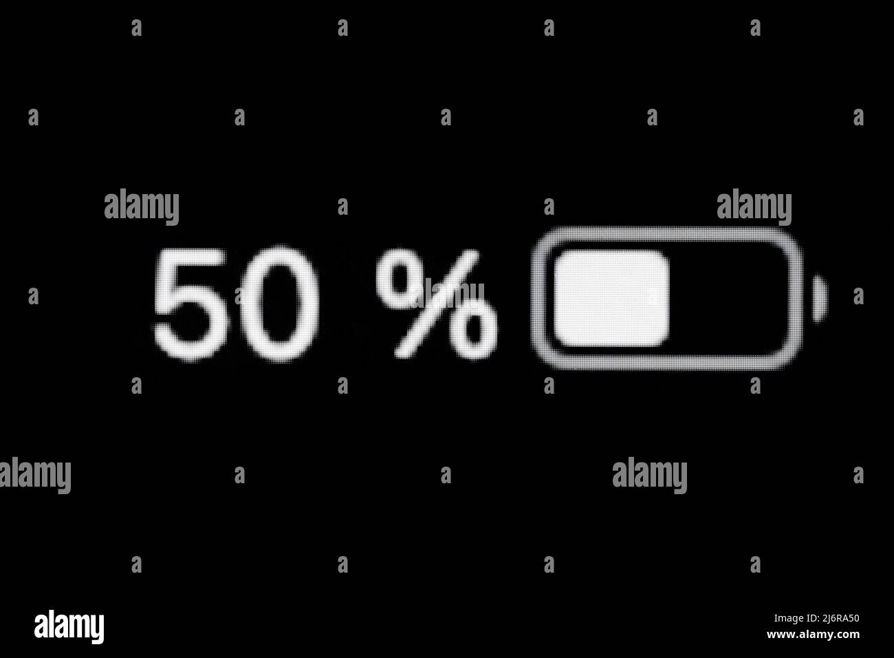 Smartphone charged battery level indicator fifty, 50 percent close