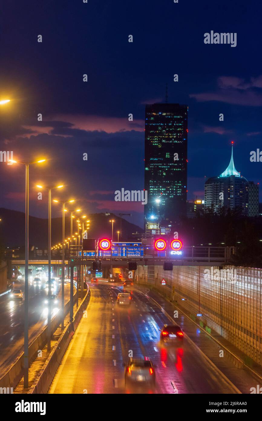 Wien, Vienna freeway Donauufer Autobahn A22, light trails of cars, wet