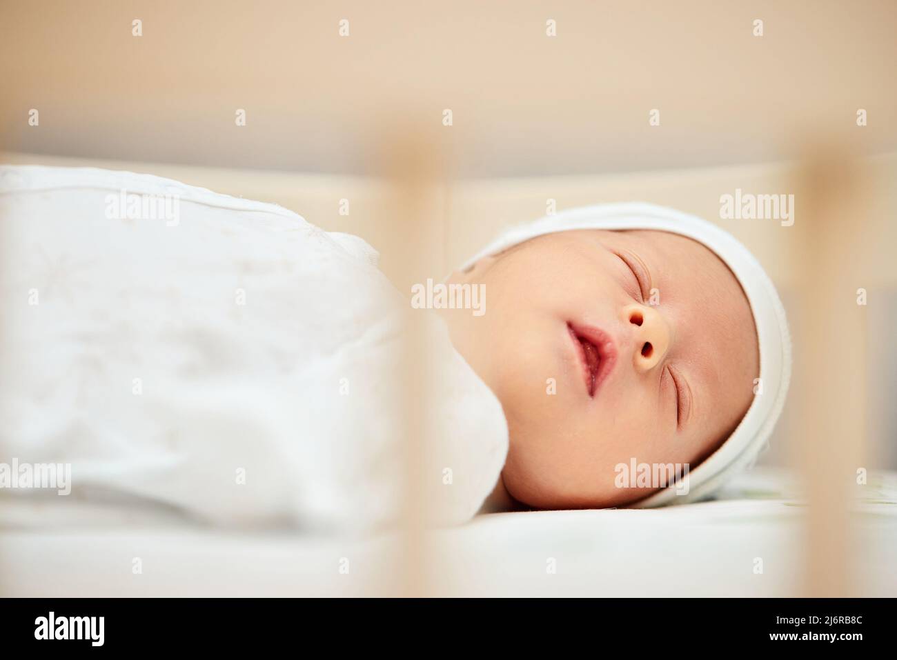 adorable new born baby sleeping in bed Stock Photo Alamy