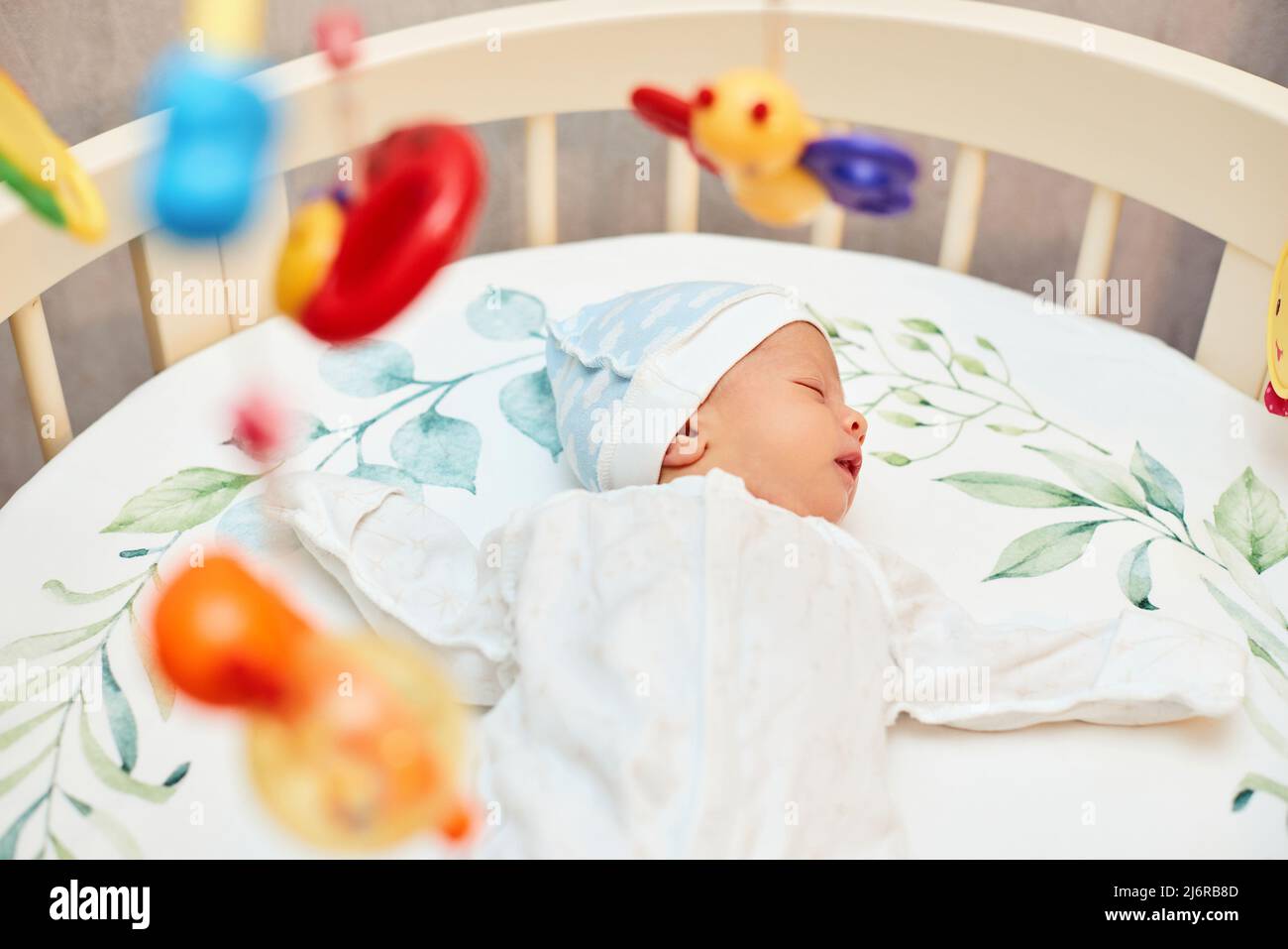 adorable new born baby sleeping in bed Stock Photo Alamy