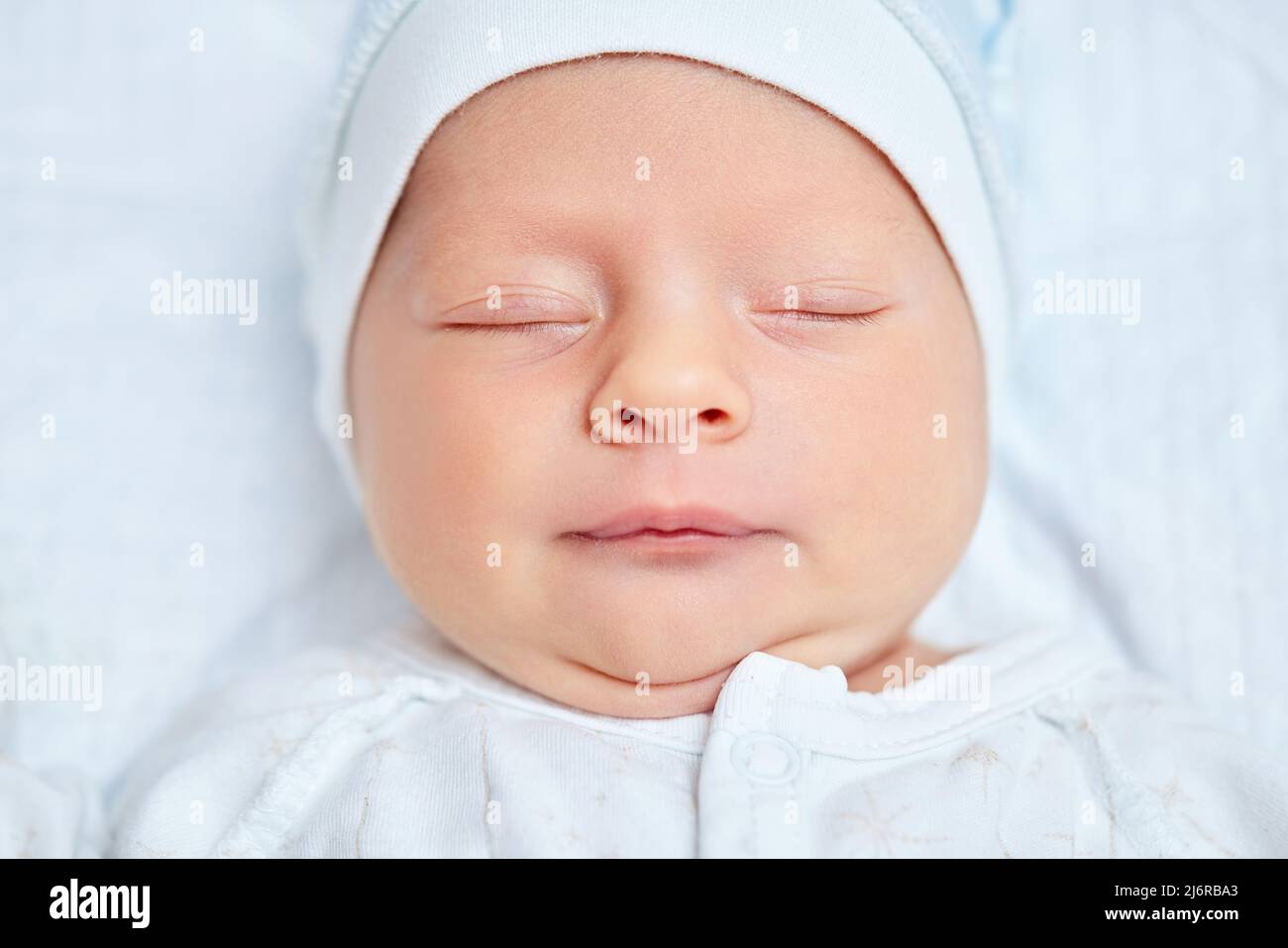 adorable new born baby sleeping in bed Stock Photo Alamy