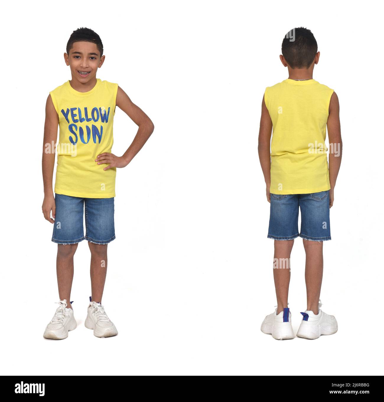 rear-view-of-full-portrait-of-a-boy-dressed-in-shorts-and-sleeveless