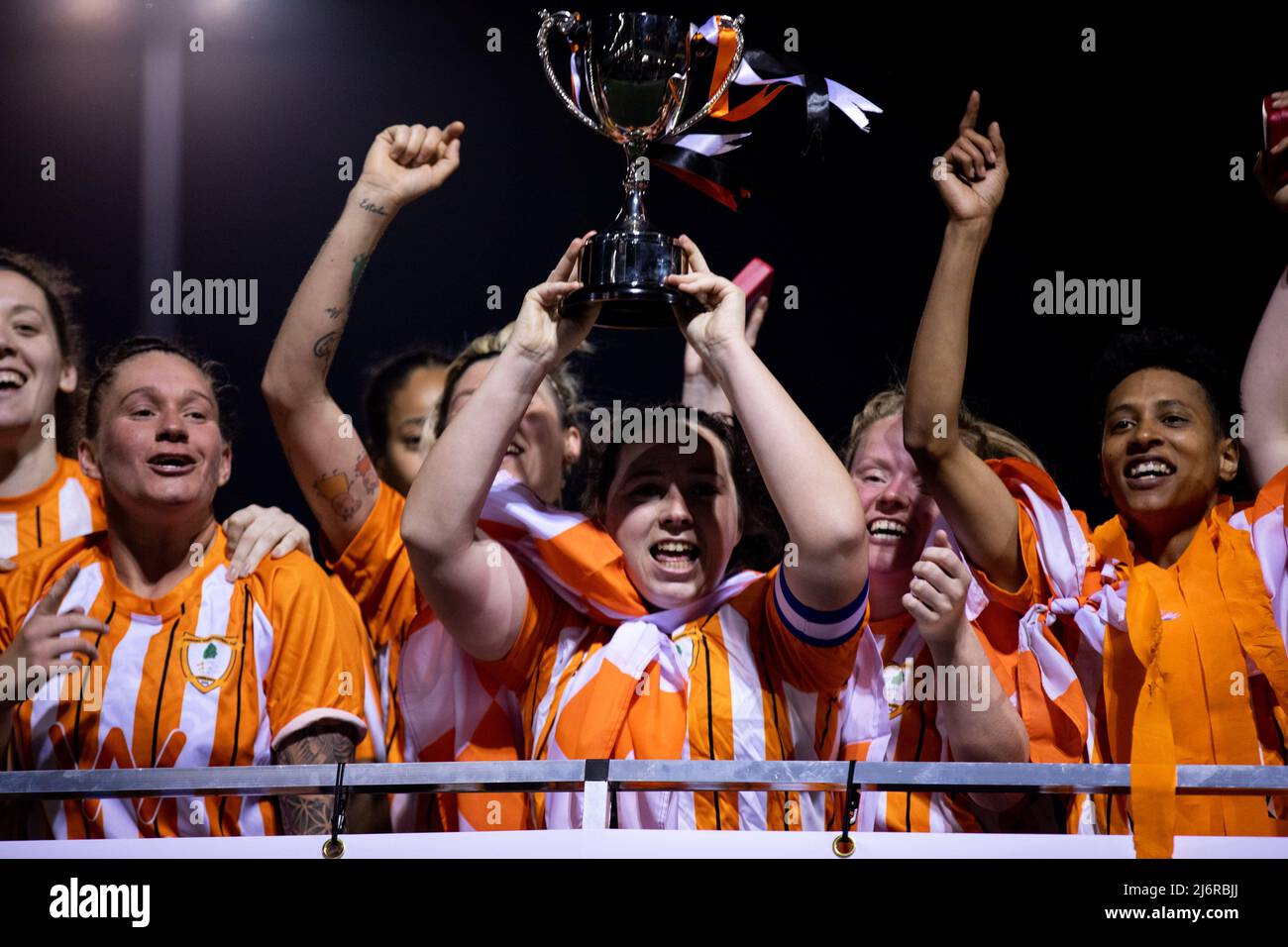 London, England. 03/05/2022, Ashford celebrate winning the Capital Womens Senior Cup game final Ashford (Middlesex) and Dulwich Hamlet at Meadowbank in London, England.  Liam Asman/SPP Stock Photo