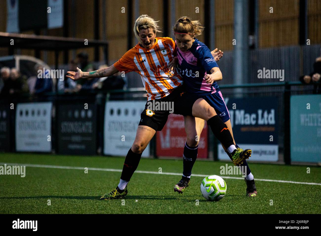 London, England. 03/05/2022, Jade Johnson (11 Ashford) and Asia Harbour Brown (18 Dulwich Hamlet) in action during the Capital Womens Senior Cup game between Ashford (Middlesex) and Dulwich Hamlet at Meadowbank in London, England.  Liam Asman/SPP Stock Photo