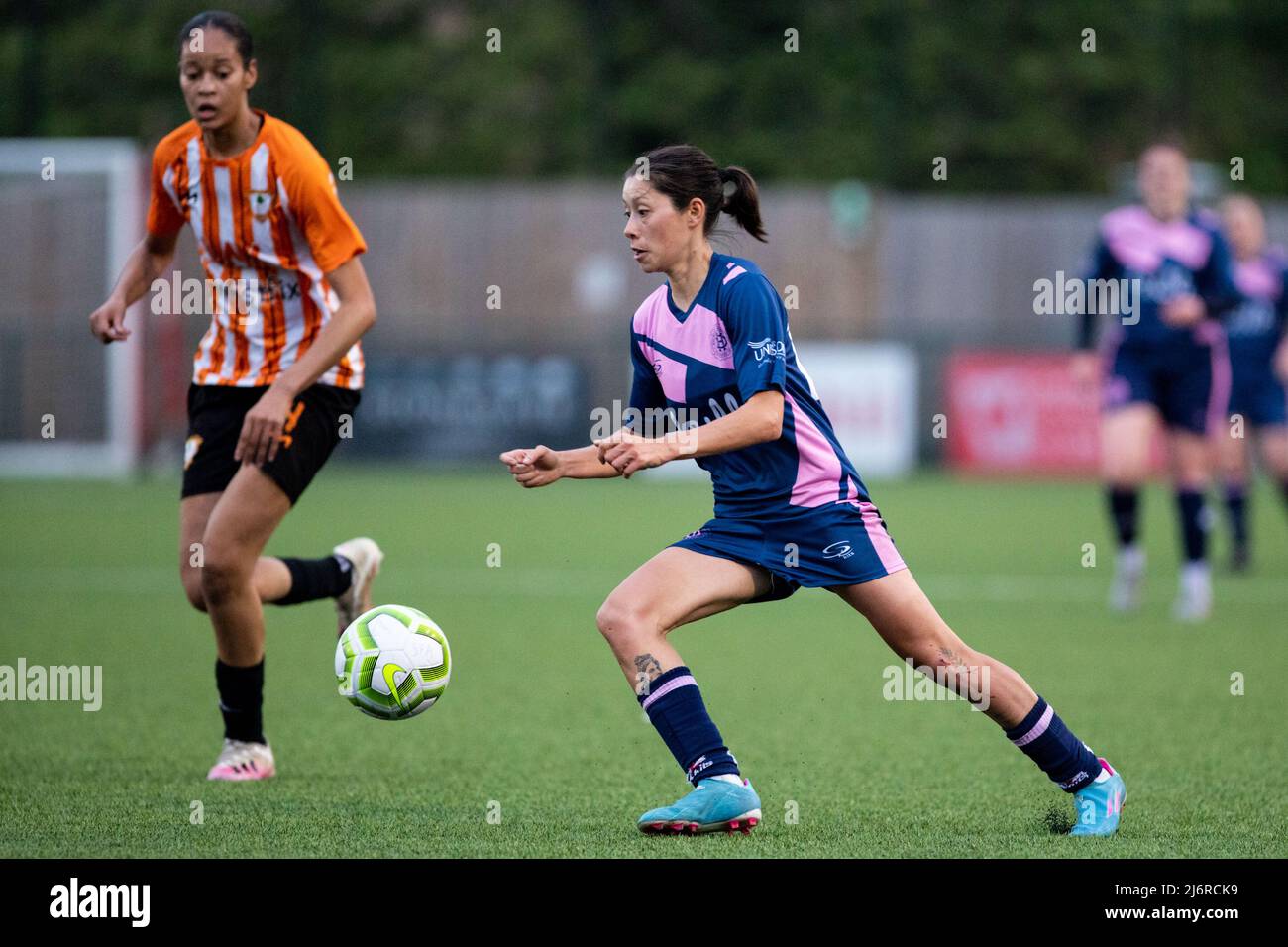 May 3, 2022, London, England, United Kingdom: London, England, May 3rd 2022: Lucy Monkman (14 Dulwich Hamlet) in action during the Capital Womens Senior Cup game between Ashford (Middlesex) and Dulwich Hamlet at Meadowbank in London, England.  Liam Asman/SPP (Credit Image: © Liam Asman/Sport Press Photo via ZUMA Press) Stock Photo