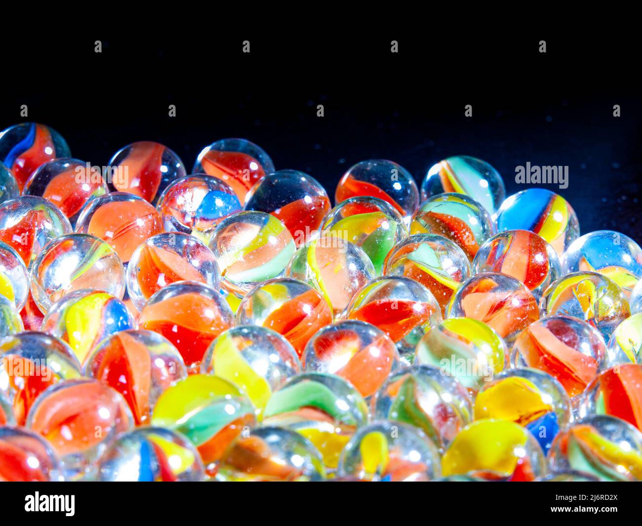 Colored glass marbles to illustrate concepts Stock Photo Alamy