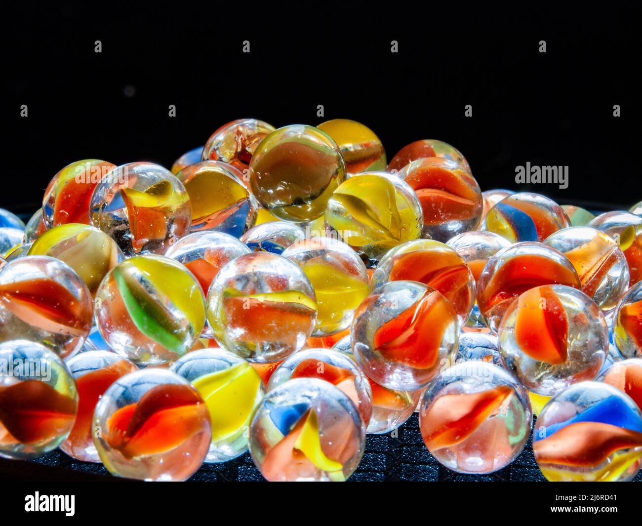 Colored glass marbles to illustrate concepts Stock Photo Alamy