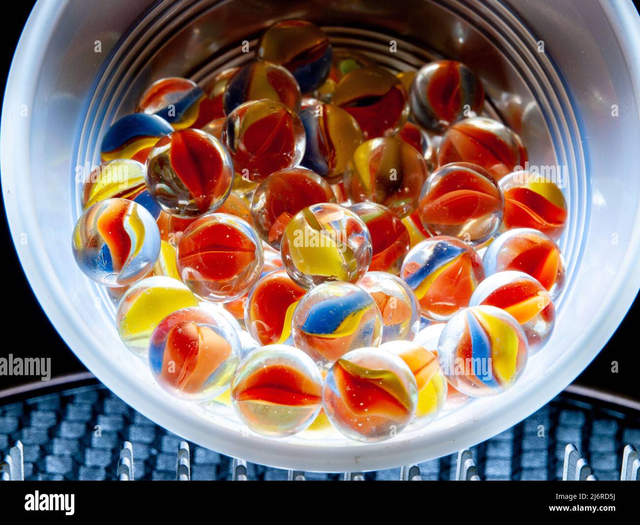 Colored glass marbles to illustrate concepts Stock Photo Alamy