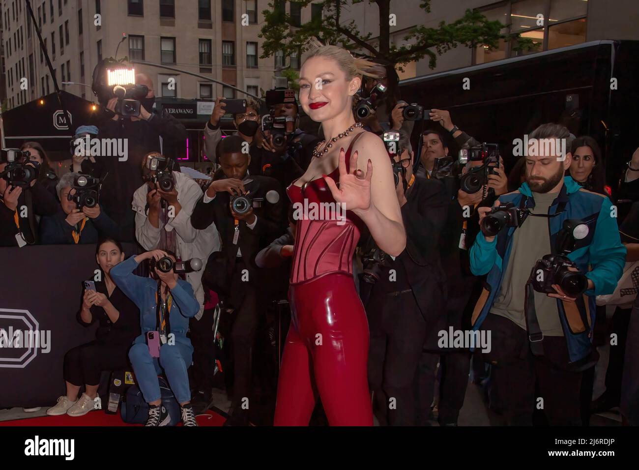 Gigi Hadid wearing Versace departs The Mark Hotel for 2022 Met Gala in