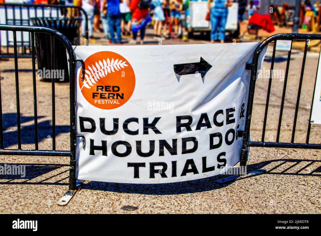 4-30-2022 Tahlequah OK - Vinyl banner sign at Red Fern Festival announces duck race and hound dog trials Stock Photo