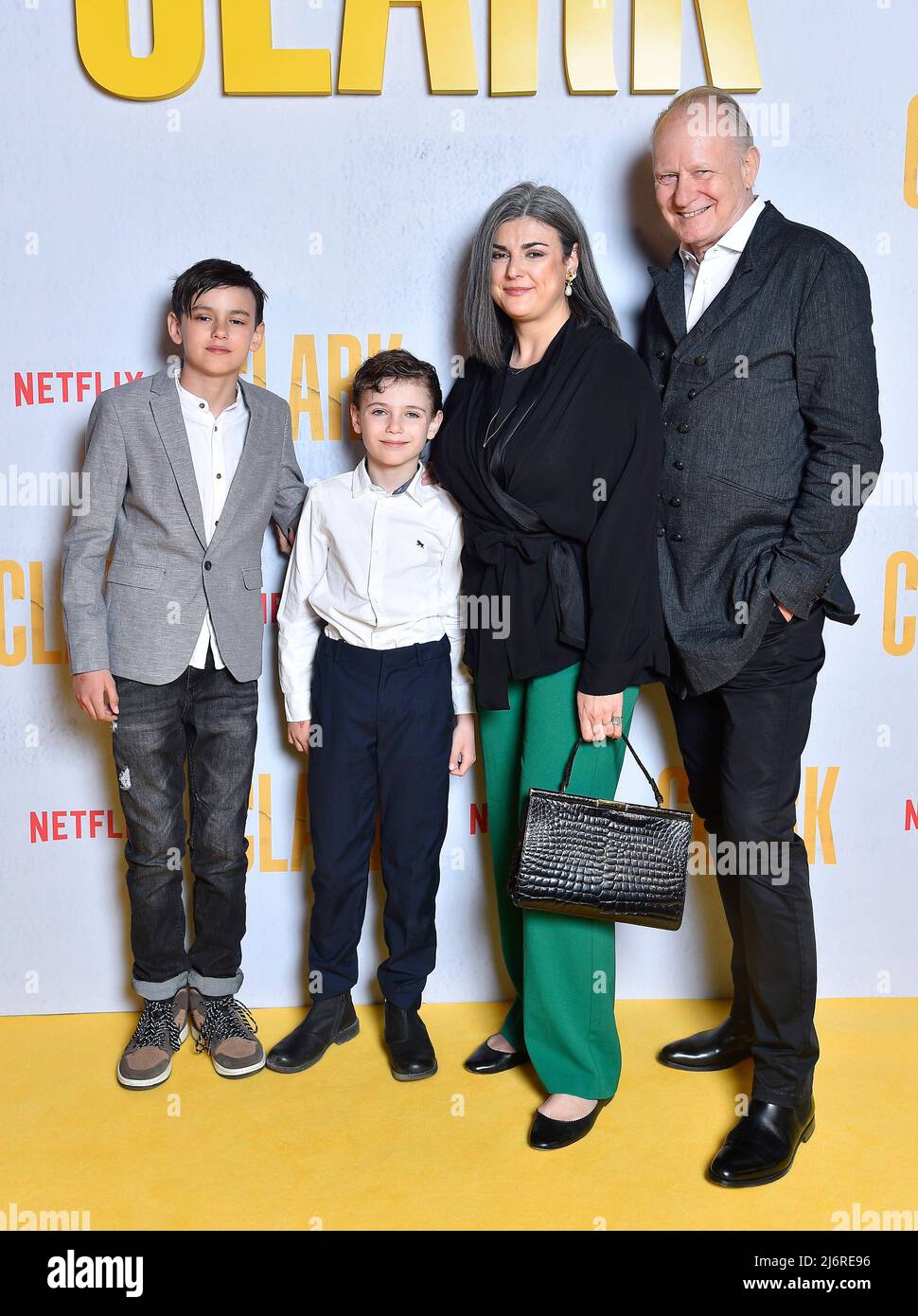 Stockholm, Sweden 3 May 2022, Stellan Skarsgård with his wife Megan Everett  Skarsgård and their children Ossian and Kolbjörn - who has his first role  in the series. on the yellow carpet