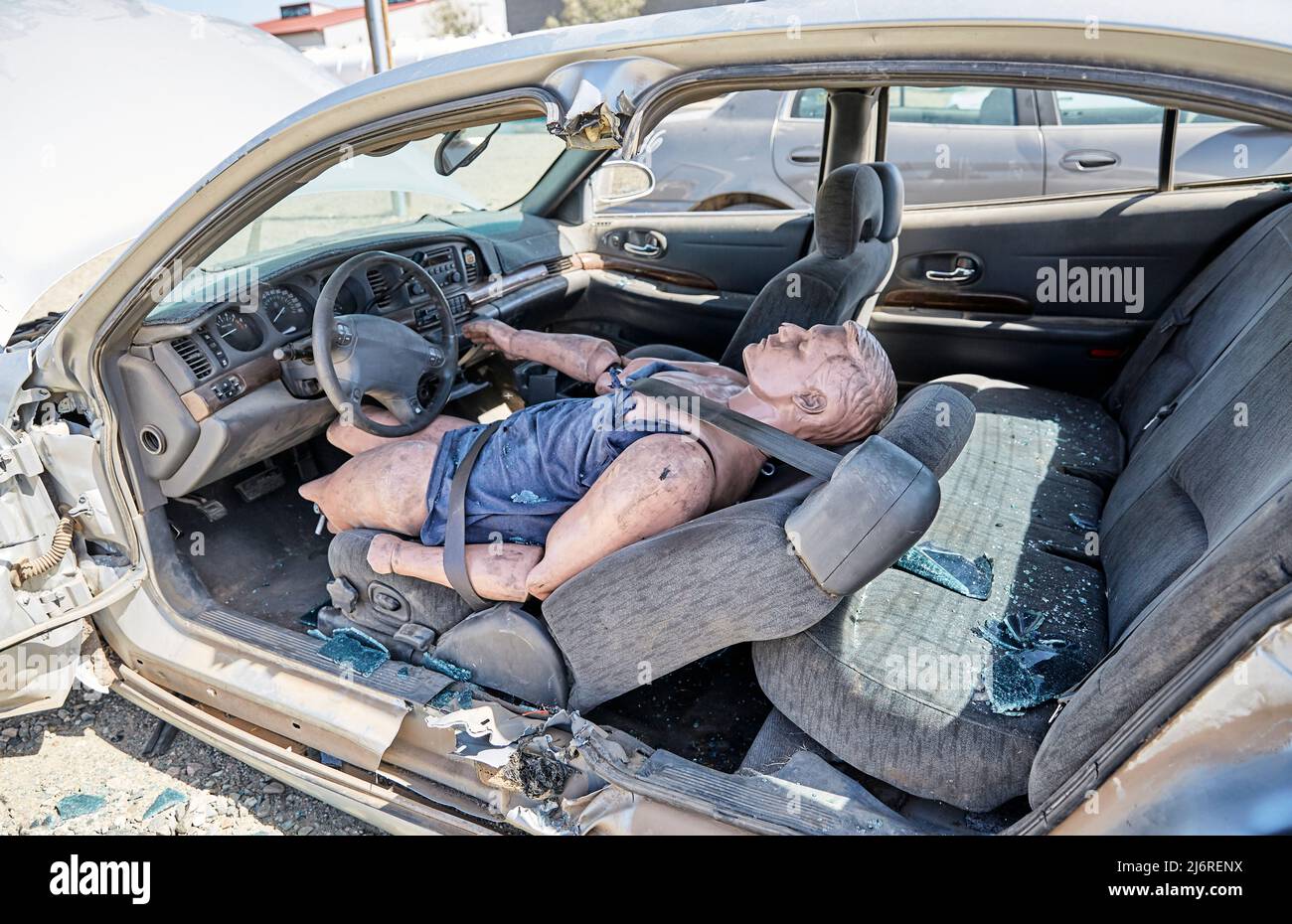 Practice Dummy in a crashed car for a demonstration Stock Photo