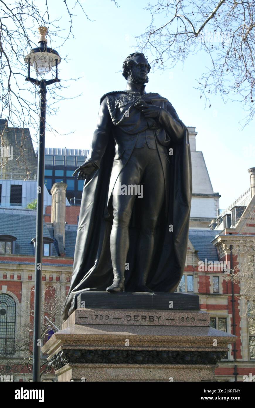 A bronze statue of Edward George Geoffrey Smith Stanley, 14th Earl of Derby, in Parliament Square, London, England, UK. Stock Photo