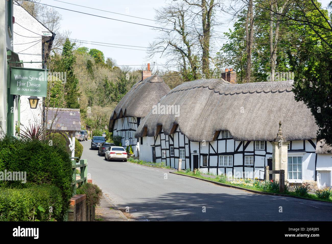 Thatched cottages from Village Green, Wherwell, Hampshire, England, United Kingdom Stock Photo