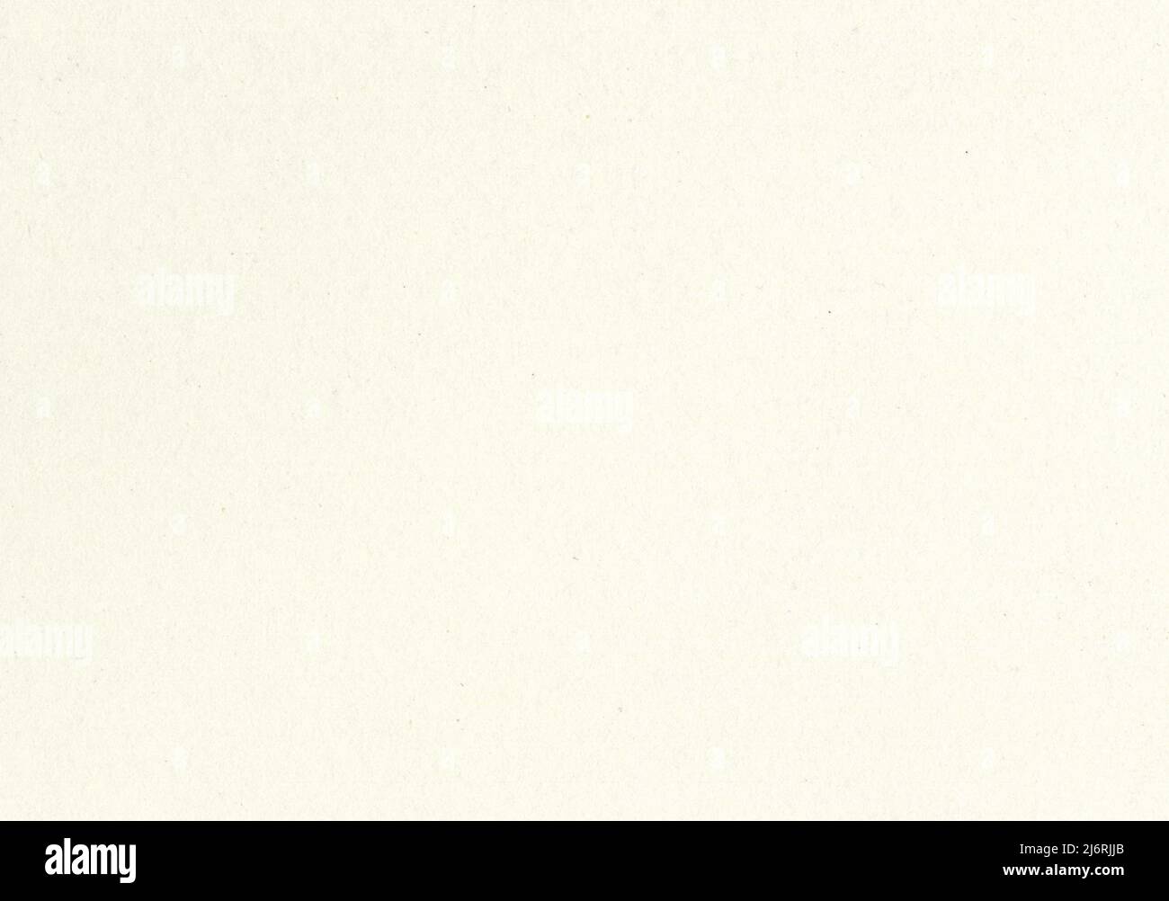 High resolution great zoom close up old light beige paper texture background scan with fine grain fiber and dust particles smooth uncoated aged paper Stock Photo