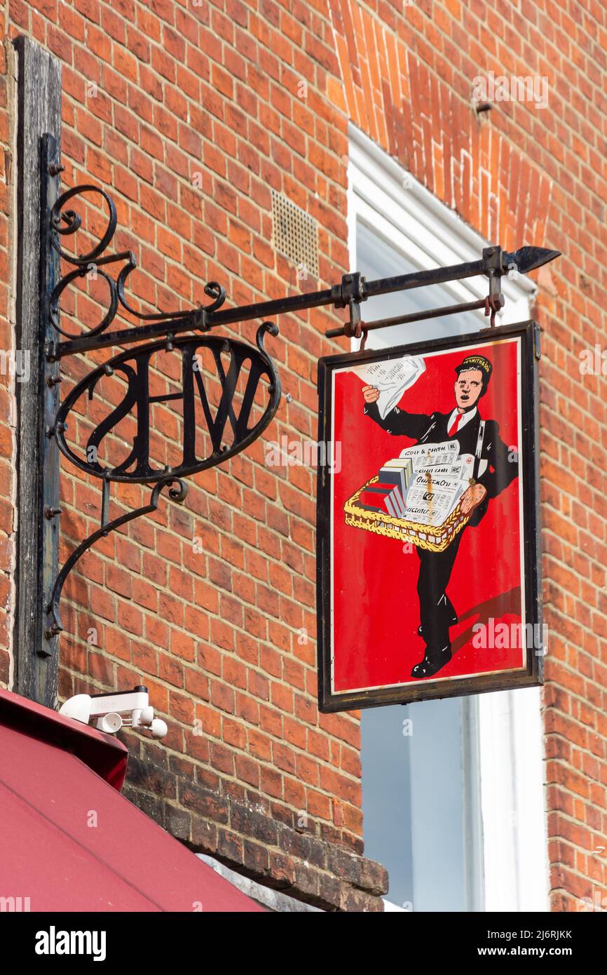 Retro tin plate sign outside W H Smith Newsagents, Market Place, Romsey, Hampshire, England, United Kingdom Stock Photo