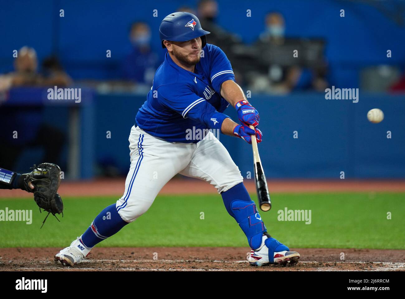 May 3, 2022, TORONTO, ON, CANADA: Toronto Blue Jays catcher Alejandro Kirk  (30) hits a double against the New York Yankees during fifth inning  American League MLB baseball action in Toronto on