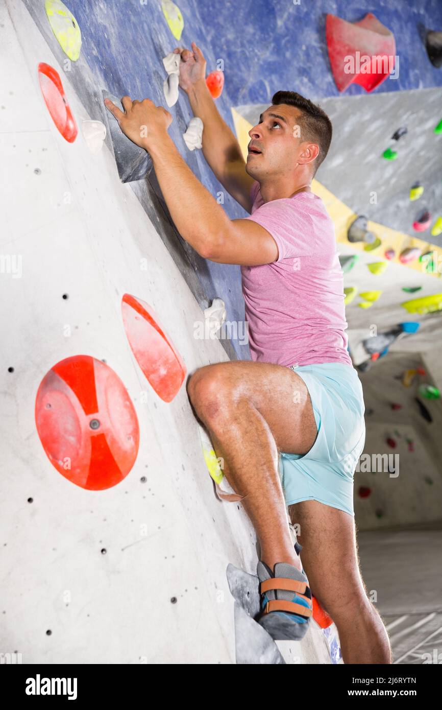 Male on climbing wall without belay Stock Photo Alamy