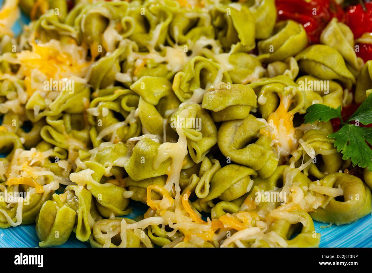 Italian spinach tortellini pasta with tomato sauce Stock Photo Alamy