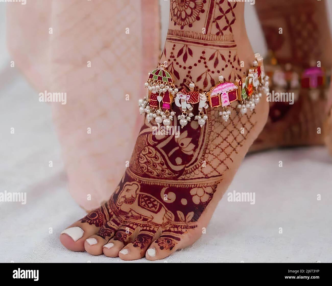 women feet decorated with Beautiful mehndi and anklets Stock Photo Alamy