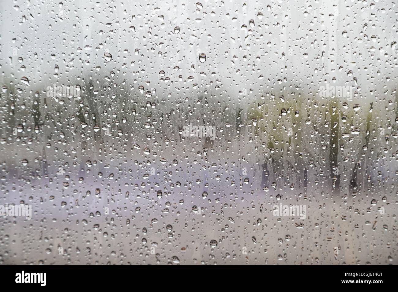 Water drop on glass windows background Stock Photo - Alamy