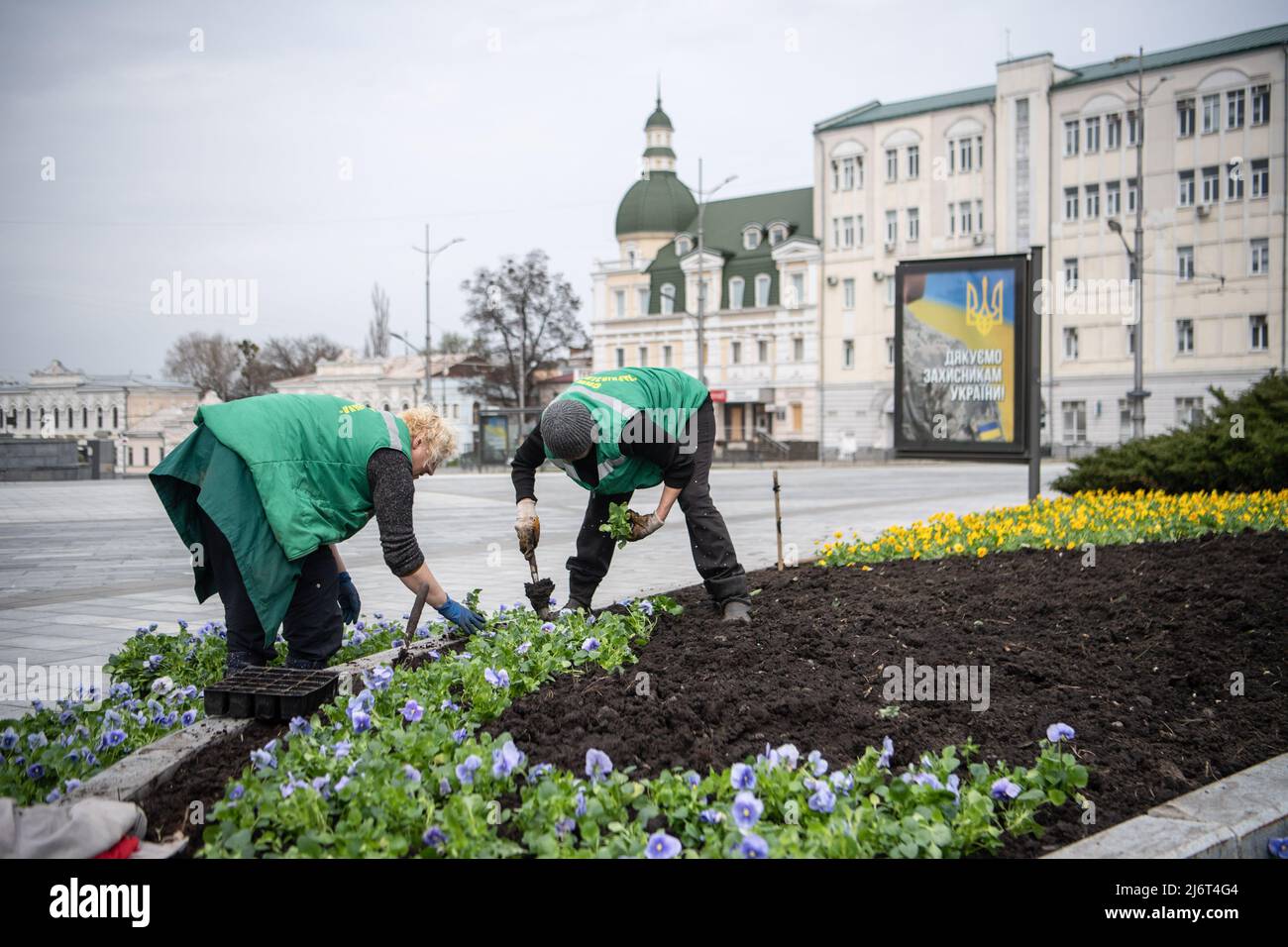 April 19, 2022, Kharkiv, Ukraine City workers plant flowers in