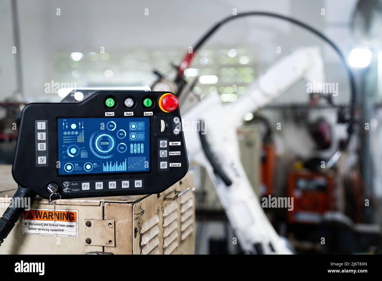 Robotic arm and its controller adept panel in a factory