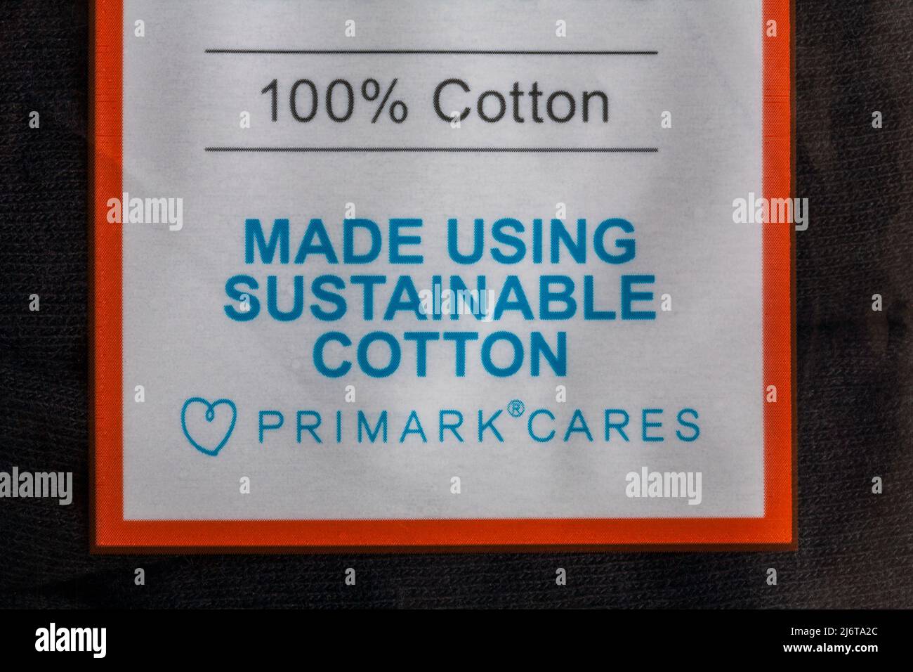 Primark Cares made using sustainable cotton label on pack of 100% cotton black knickers from Primark Stock Photo