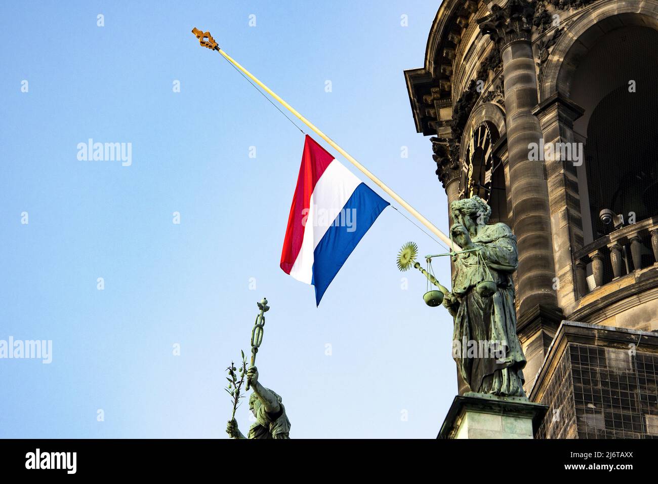 2022-05-04 07:05:43 AMSTERDAM - Flags hang at half mast as a sign of reverence and respect for war victims on the day of National Remembrance Day. ANP RAMON VAN FLYMEN netherlands out - belgium out Stock Photo