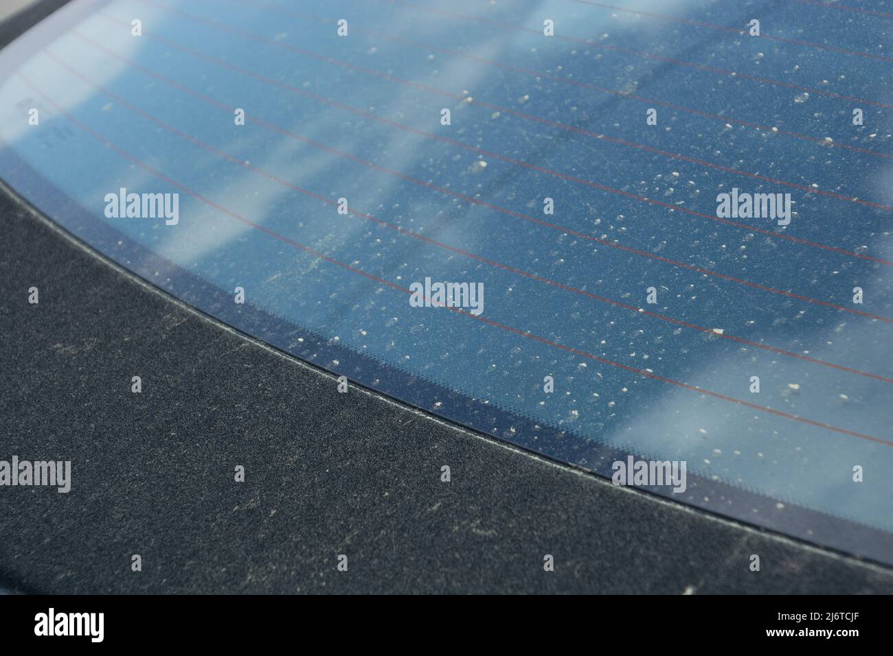 convertible fabric roof of a modern car soiled with pollen Stock Photo