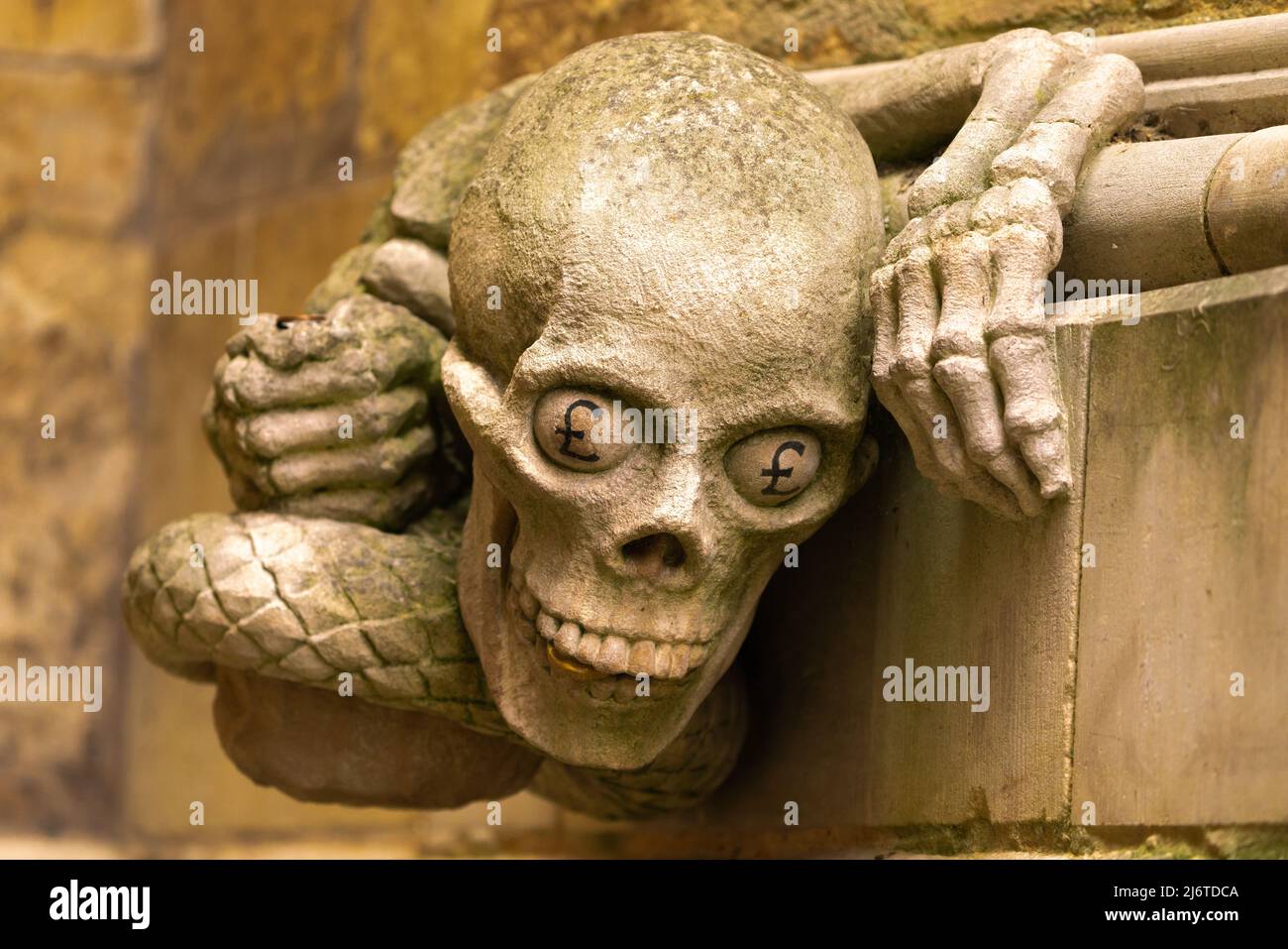 Gargoyles, stone statues, attached, buildings, decoration, waterspouts, rainwater flow, carved, solid stone, granite, ornamental, artistic function. Stock Photo
