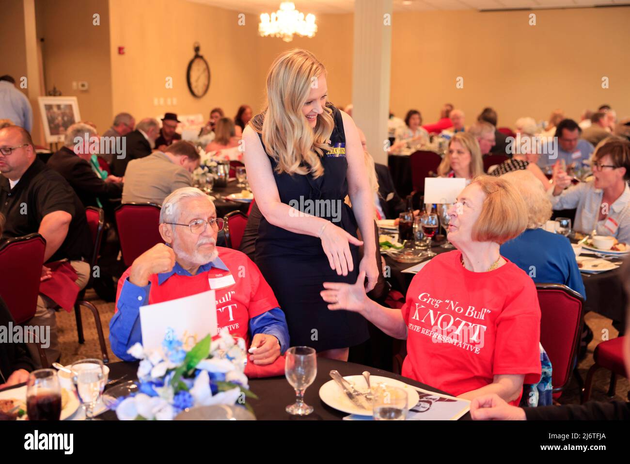 Indiana 9th District Republican candidate Erin Houchin greets potential constituents during the Monroe County Republican Party 2022 Lincoln Day Dinner in Bloomington. Houchin won the Republican primary Tuesday night and will face Democrat Matt Fyfe, from Bloomington, in the fall midterm election. Houchin refers to herself as a “Trump Conservative.” (Photo by Jeremy Hogan / SOPA Images/Sipa USA) Stock Photo