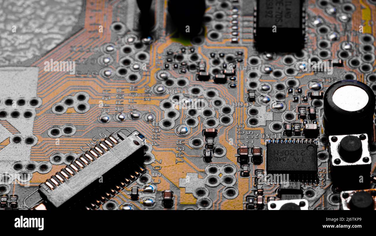 Macro Close up of printed wiring and components on PC circuit board ...