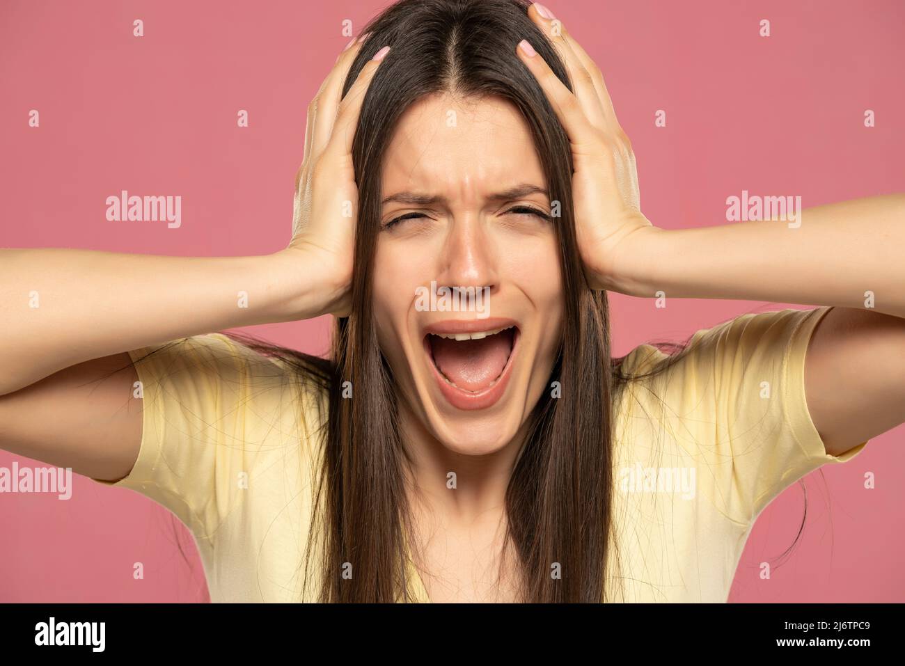 Closeup portrait stressed frustrated woman screaming having temper
