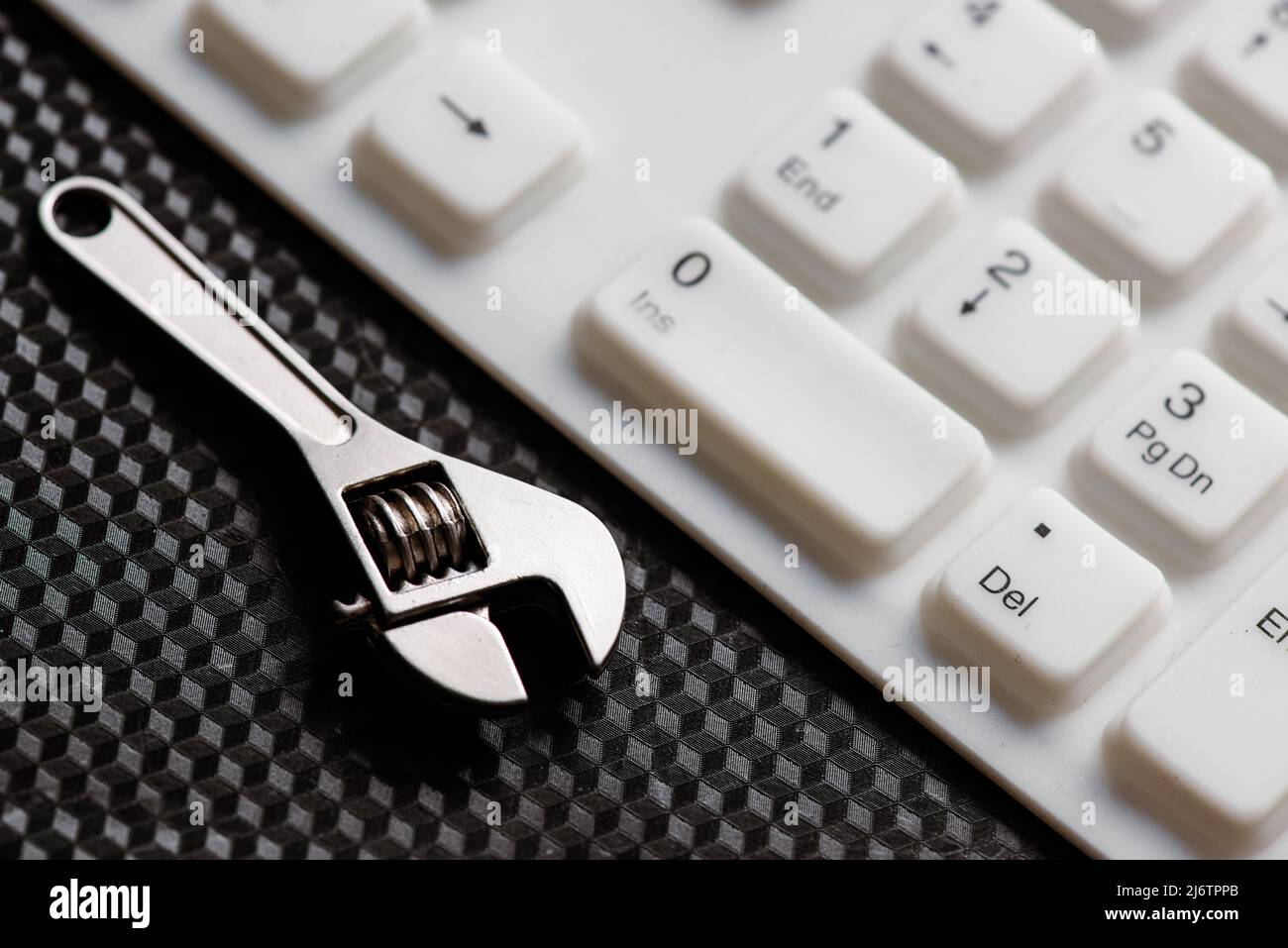 Electronic technical support concept. Wrenches Stock Photo