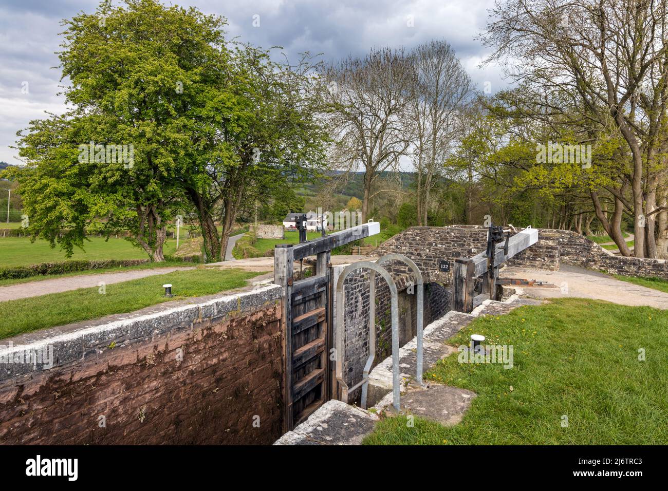 Lower Llangynidr Locks and Bridge 132 on the Monmouthshire and Brecon Canal in the Brecon Beacons National Park, South Wales. Stock Photo