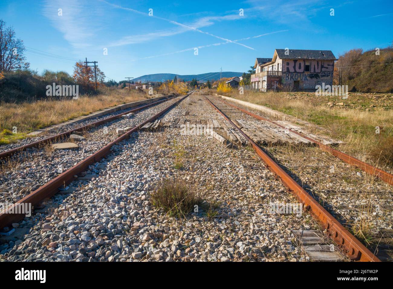 Tracks, old Madrid-Burgos railway. Robregordo, Madrid province, Spain. Stock Photo