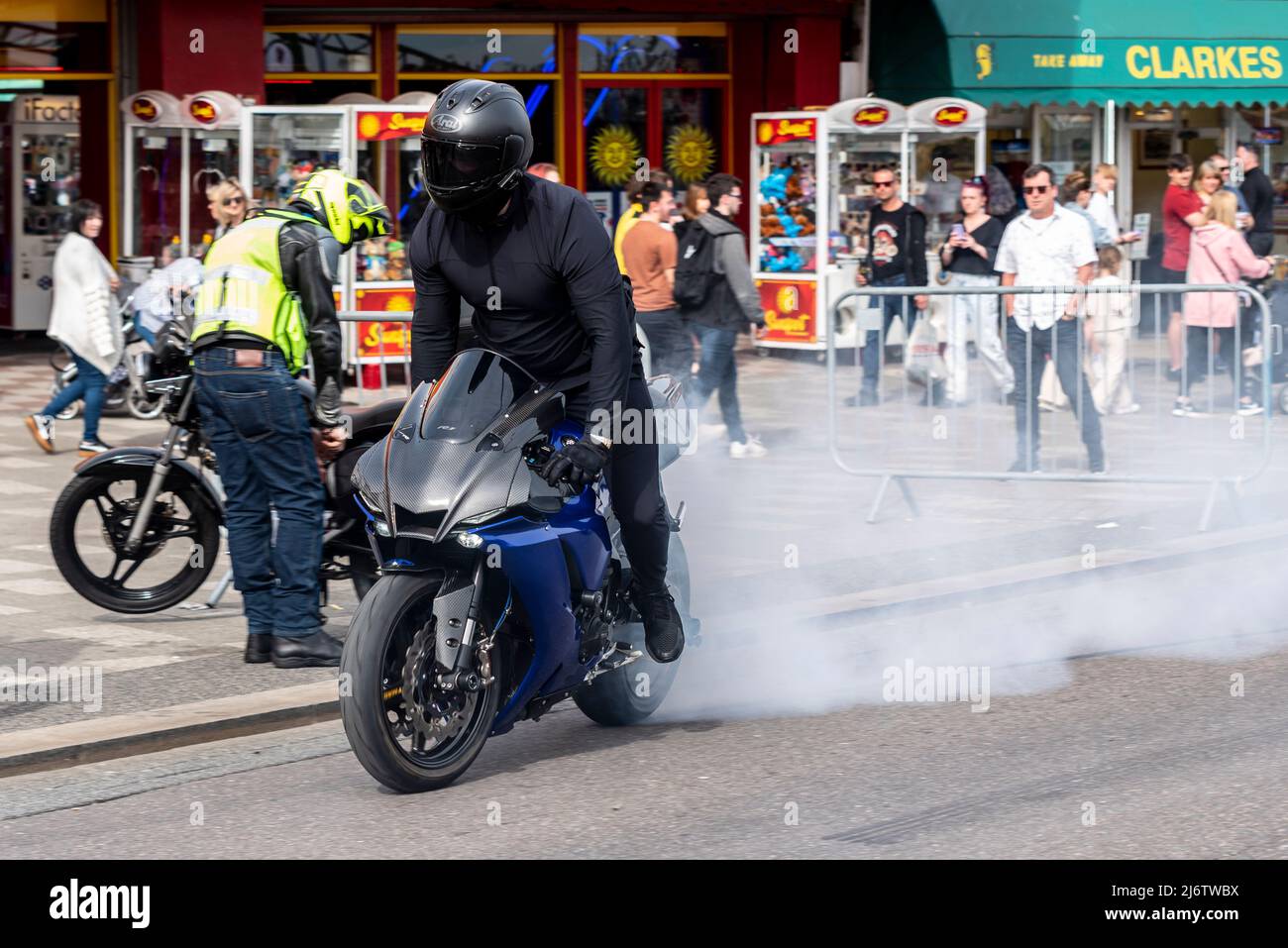 Motorbike rider smoking the rear tyre at the Southend Shakedown 2022 motorcycle event on Easter Bank Holiday Monday in Southend on Sea, UK. Stock Photo