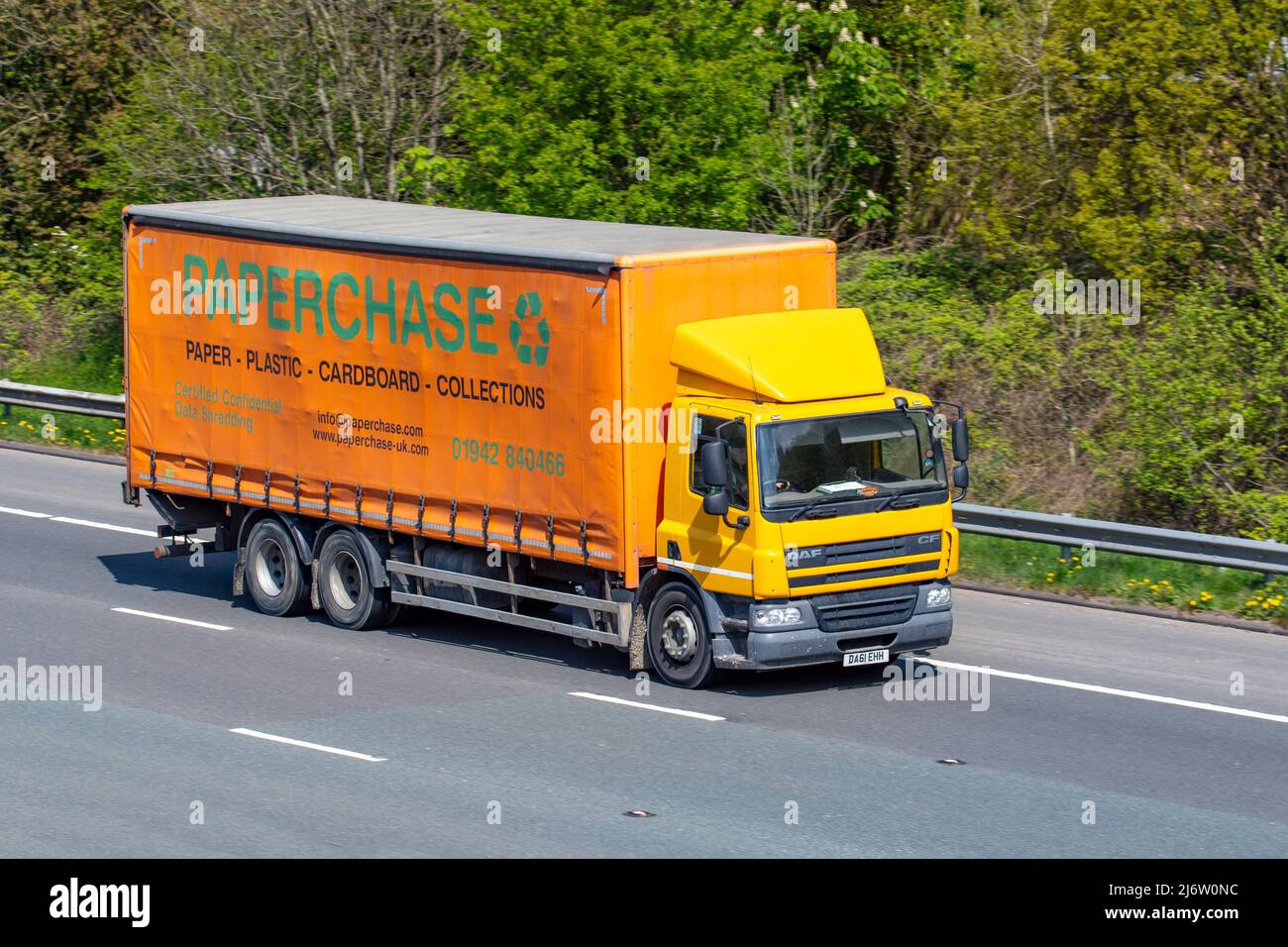 PAPERCHASE, paper, plastic, cardboard collections : Orange DAF CF Truck FAG 75.310 9200cc diesel rigid lorry; Stock Photo