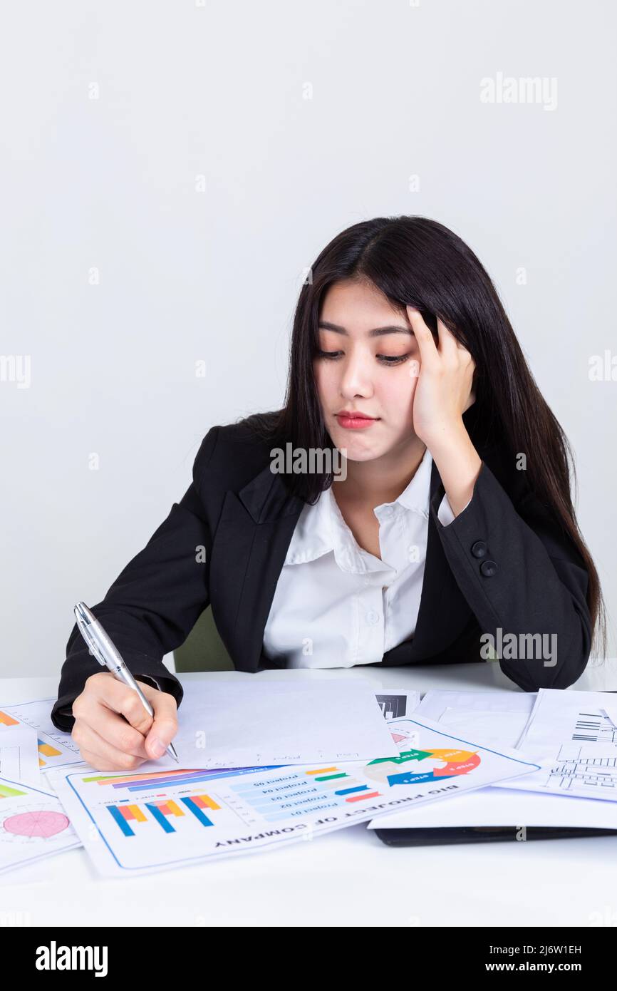 asian business woman working in office with documents Stock Photo - Alamy