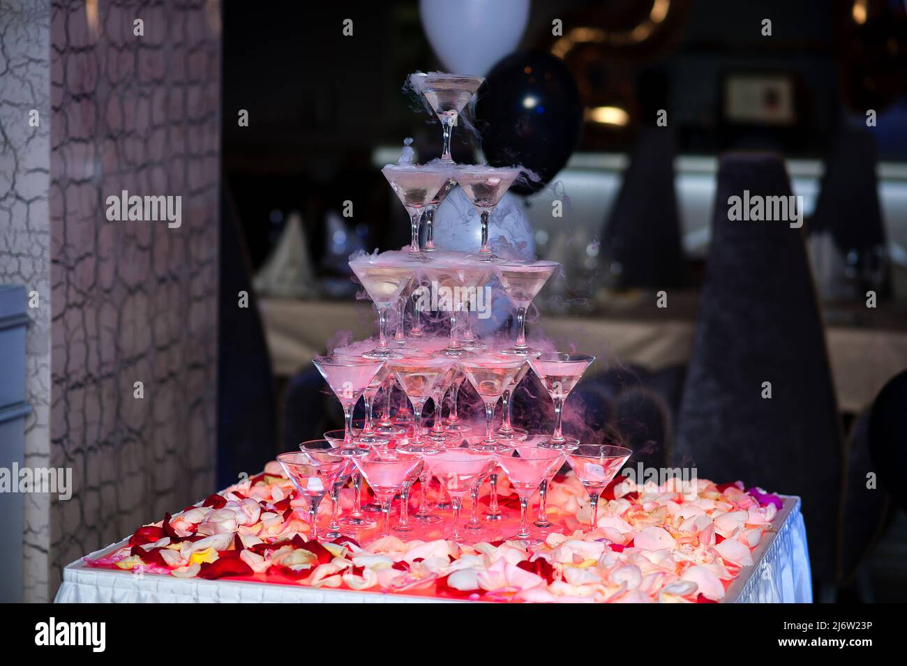 a pyramid of champagne glasses at a festive event Stock Photo Alamy