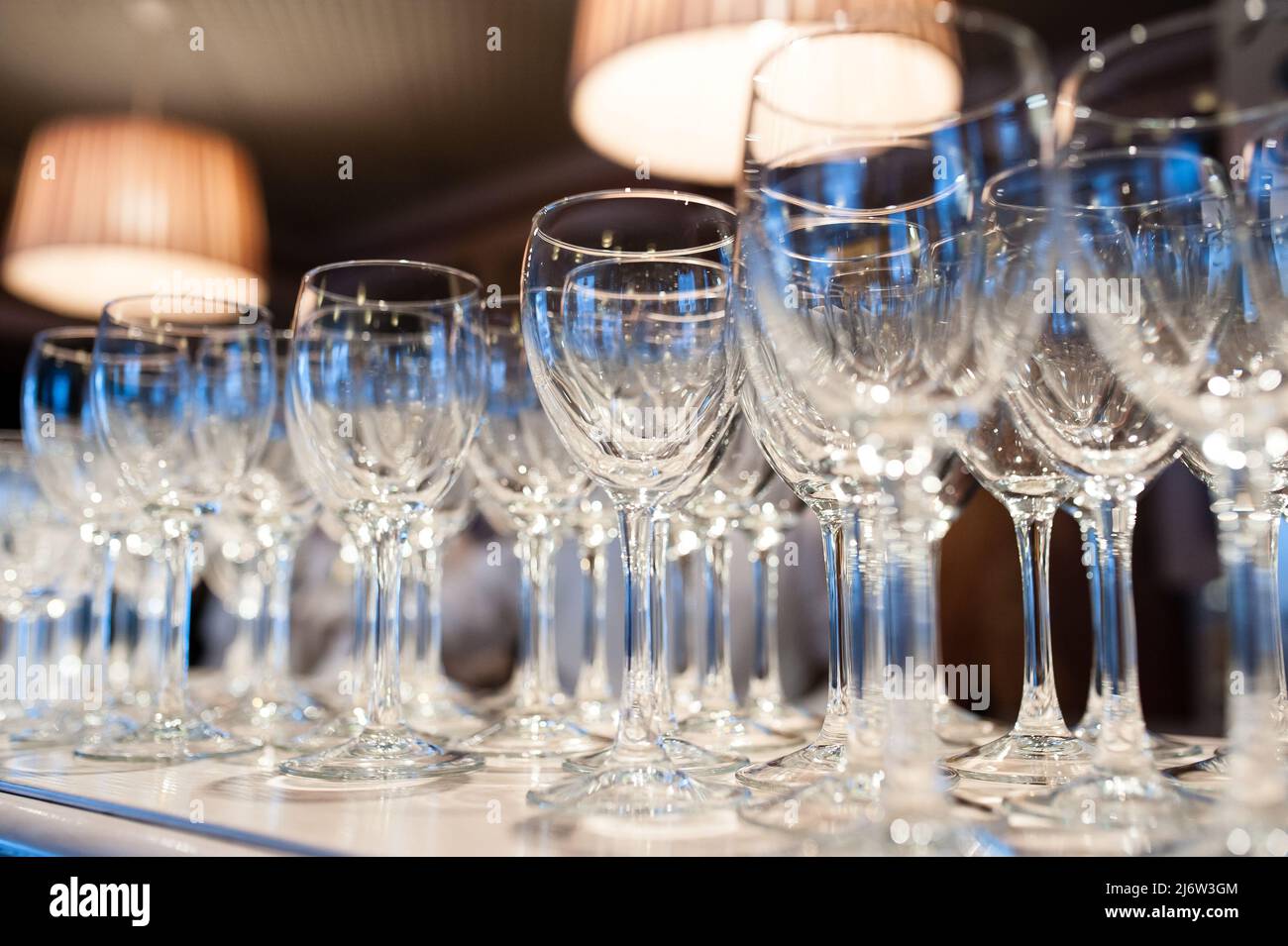 Composition of empty glasses for champagne at a festive event Stock
