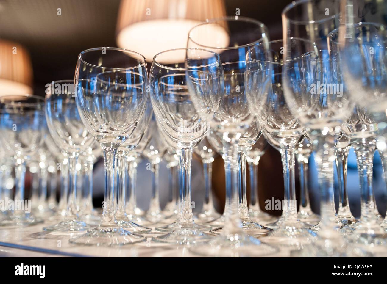 Composition of empty glasses for champagne at a festive event Stock