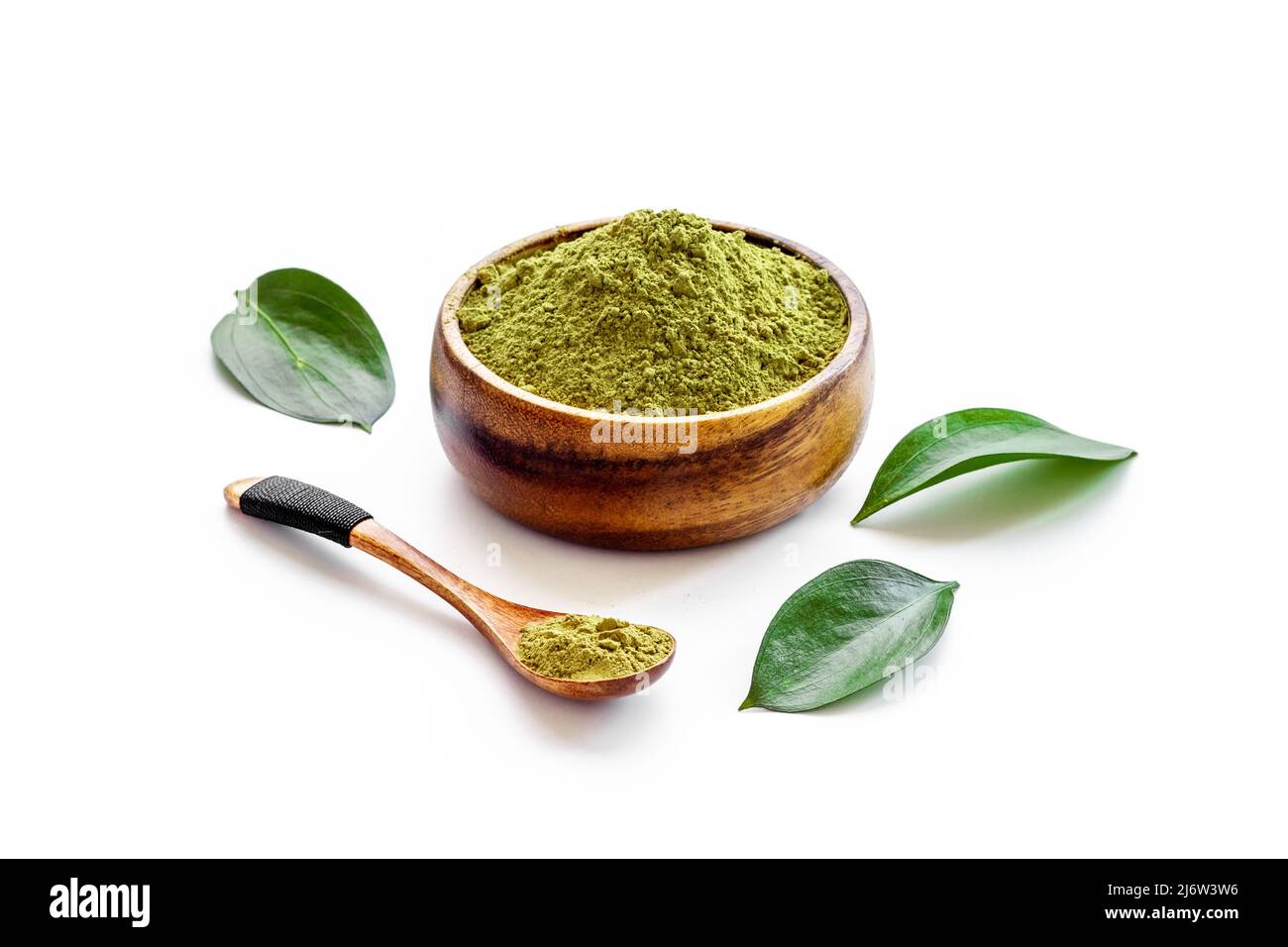 Matcha tea powder in bowl with leaf. Asian beverage concept Stock Photo