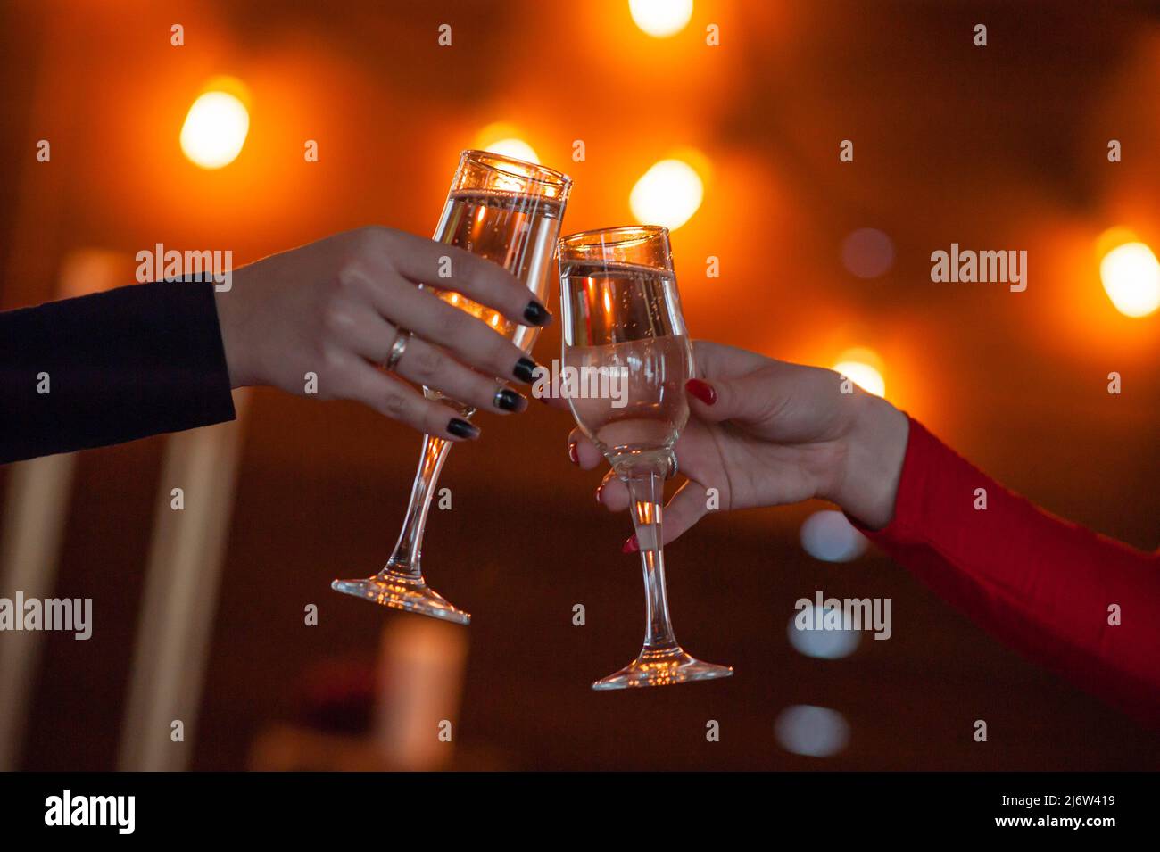 Celebration. People holding glasses of champagne making a toast Stock ...