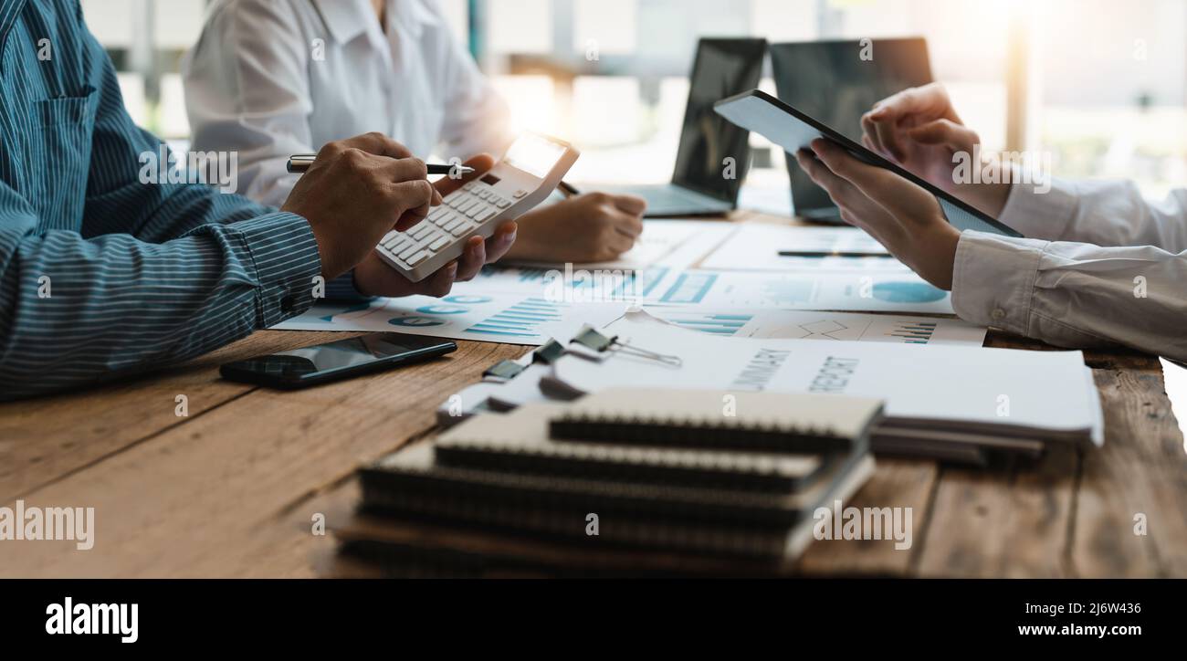 Business People Analyzing Statistics Business Documents, Financial Concept. Stock Photo