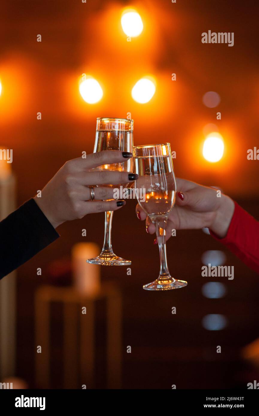 Celebration. People holding glasses of champagne making a toast Stock ...
